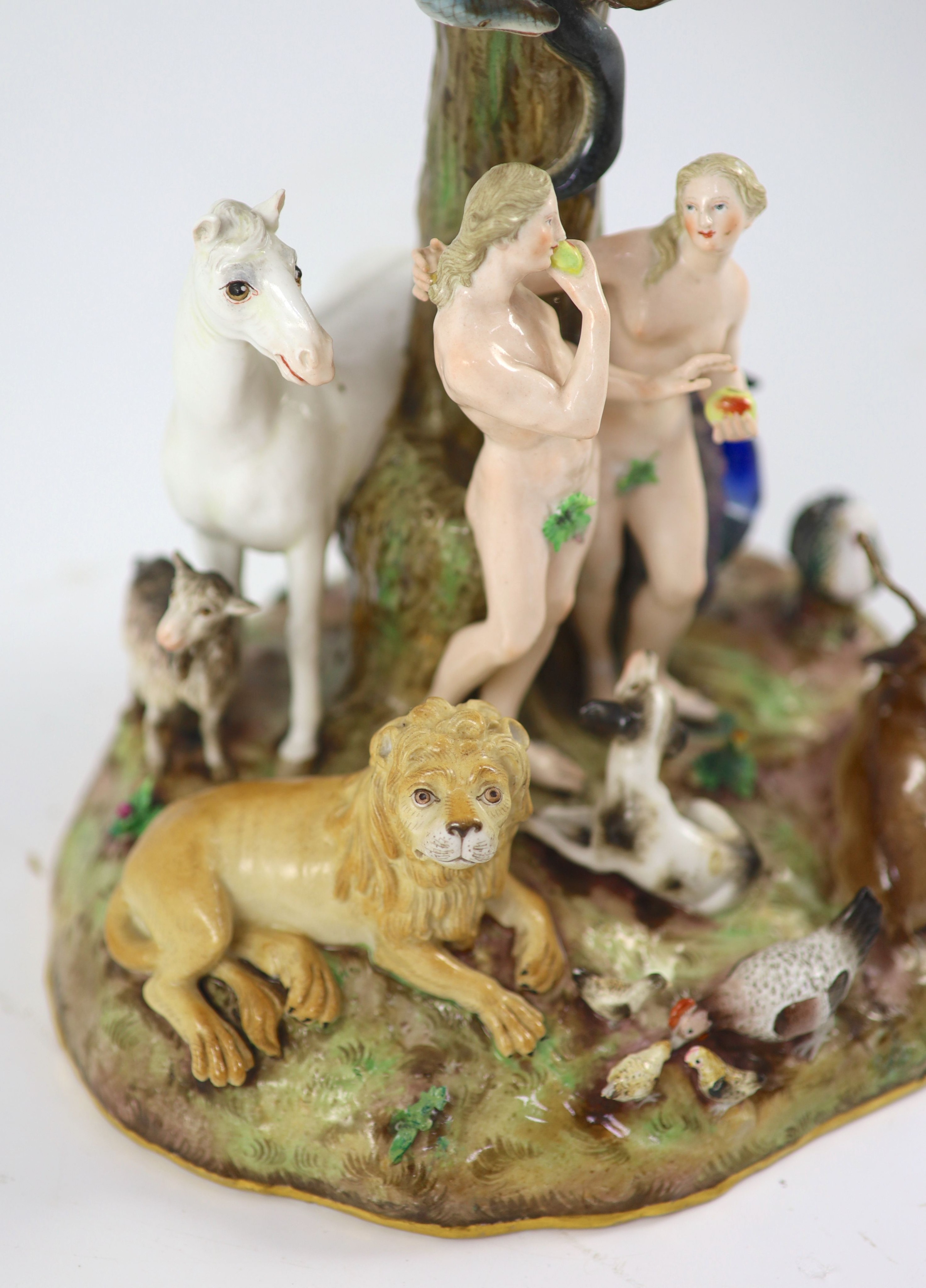 A Meissen figural group of the Garden of Eden, 19th century, 32 cm high, losses and restoration